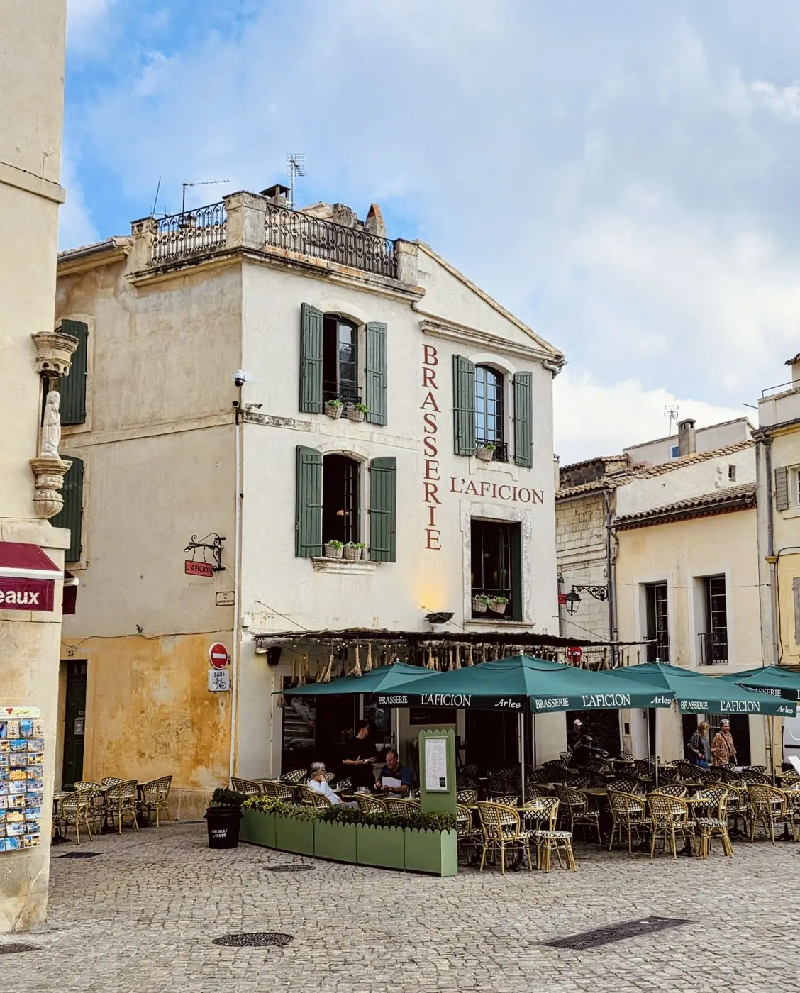 A café terrace on a corner of the old town of Arles