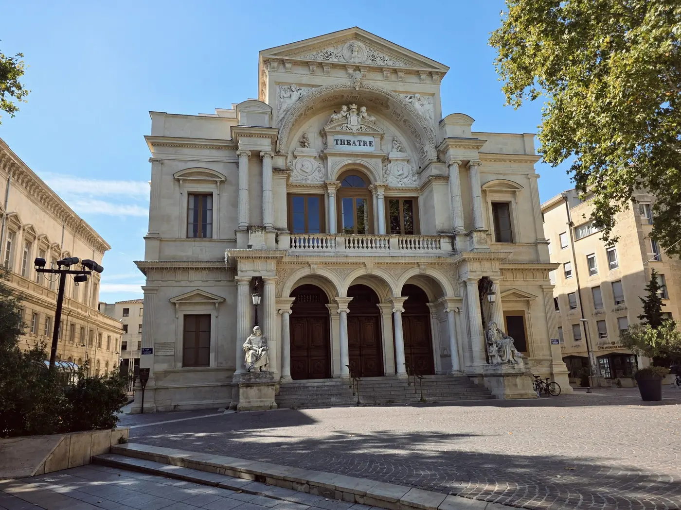 The theatre in the old town of Avignon, with its columns, statues and arched portico